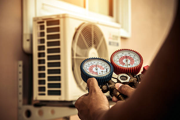 Professional Air Conditioning Service technician working in Roscoe, PA